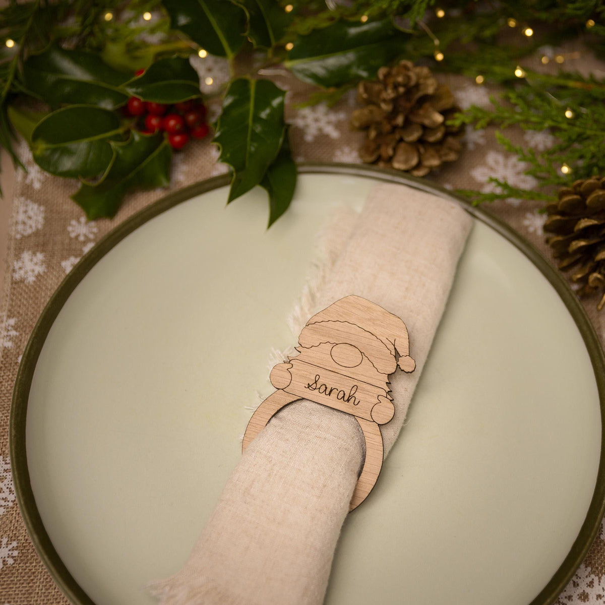 Wooden napkin ring featuring a gonk design
