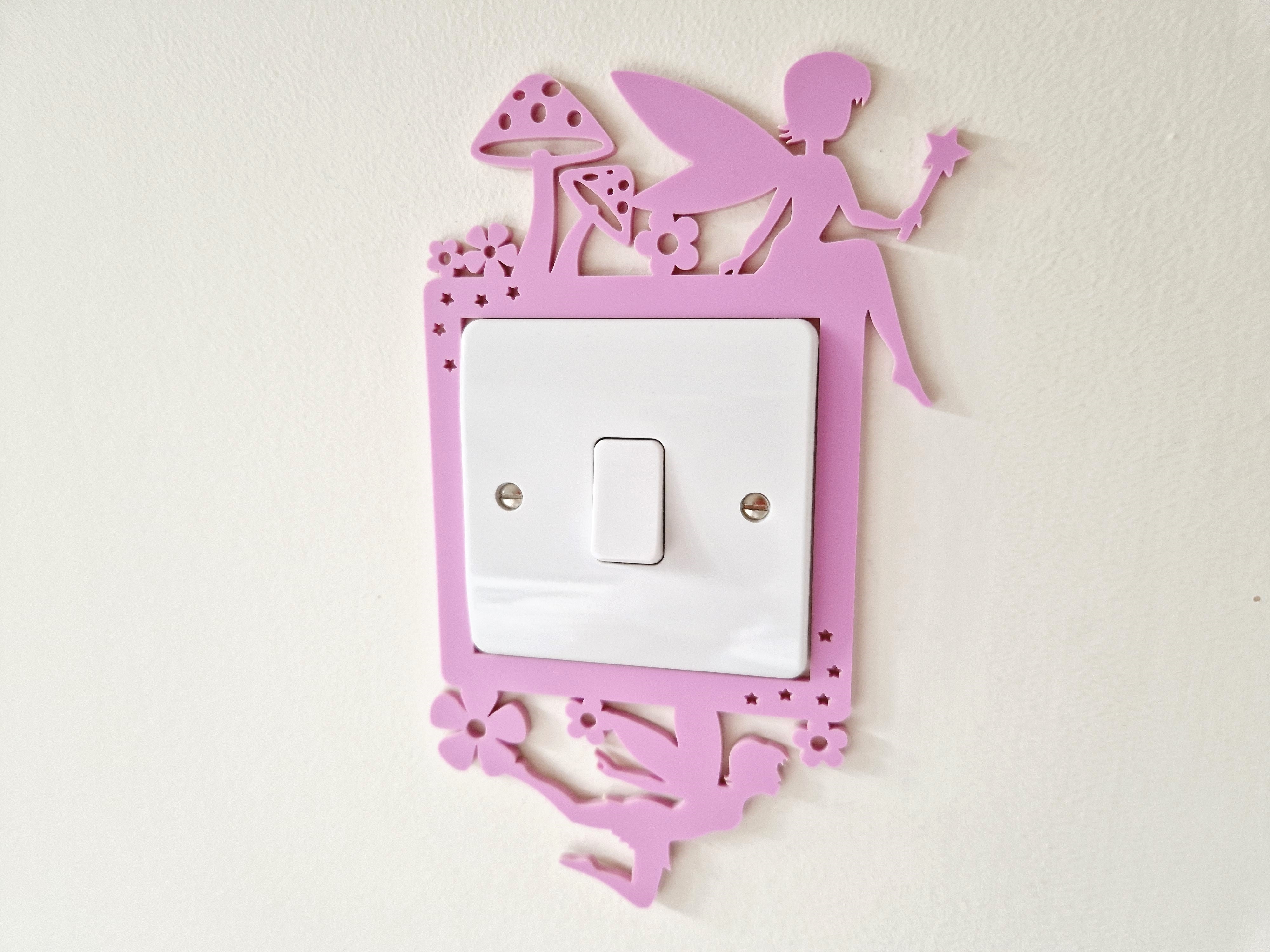 Decorative pink switch plate with fairy design