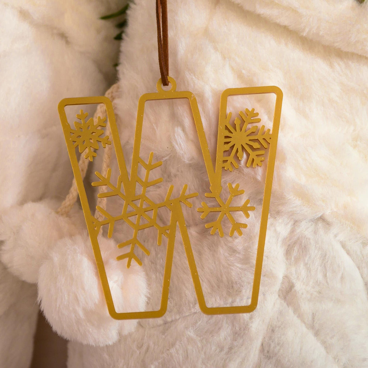 Snowflake design gold stocking tag