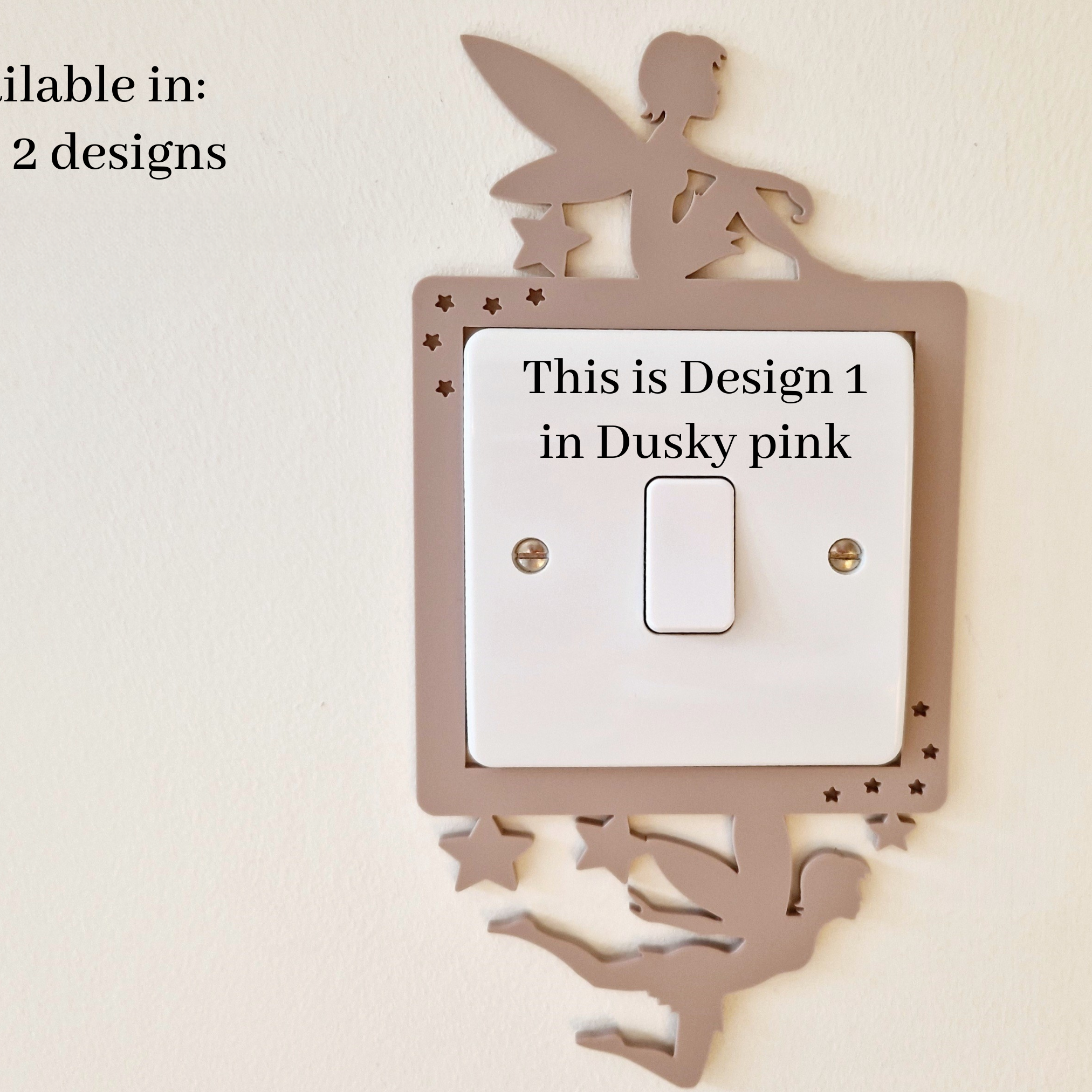 a light switch with a decorative fairy silhouette on it, and there is text indicating that this is the first design in the "Dusky pink" color scheme.
