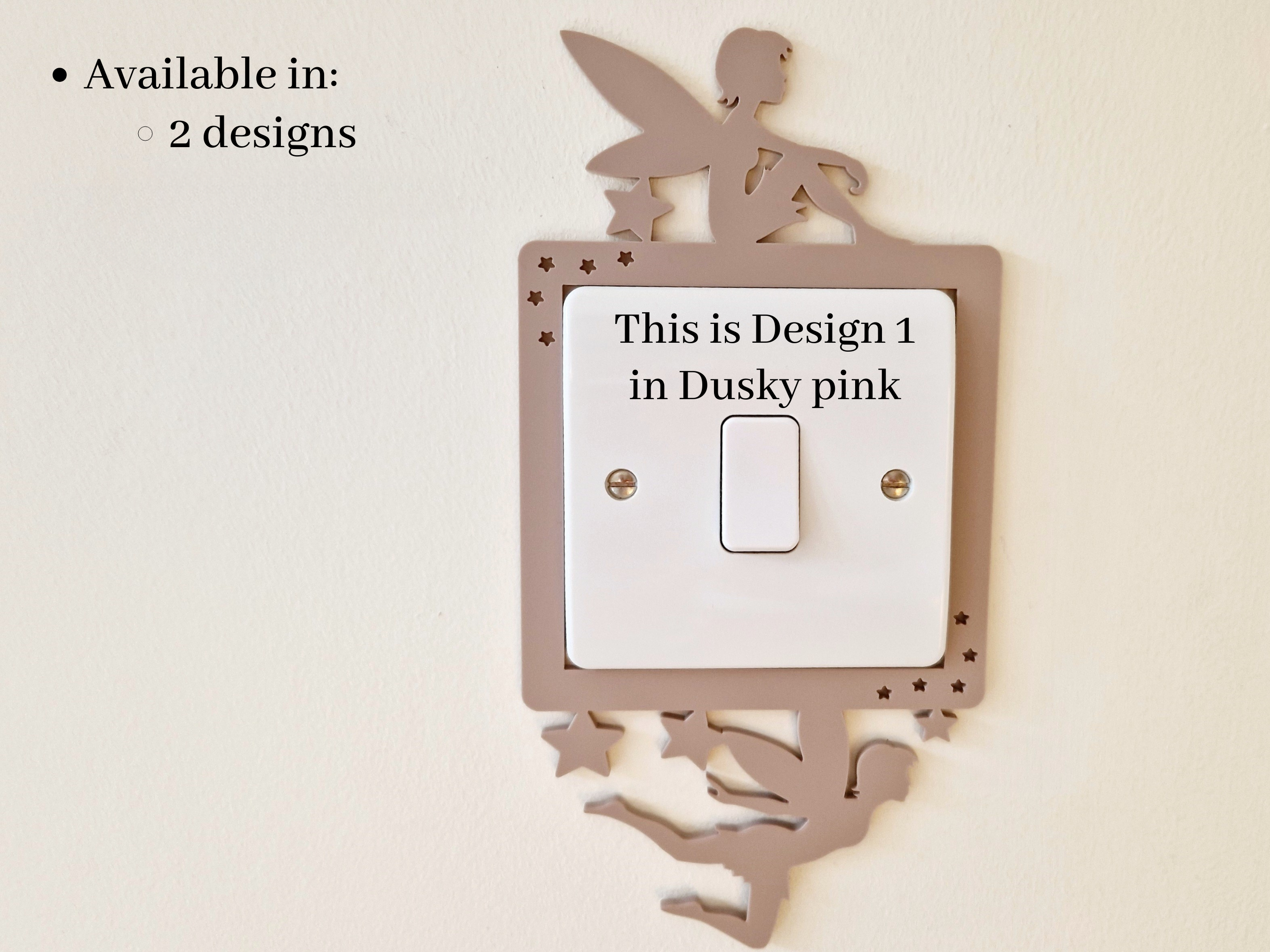 a light switch with a decorative fairy silhouette on it, and there is text indicating that this is the first design in the "Dusky pink" color scheme.