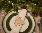Wooden place setting in shape of a santa