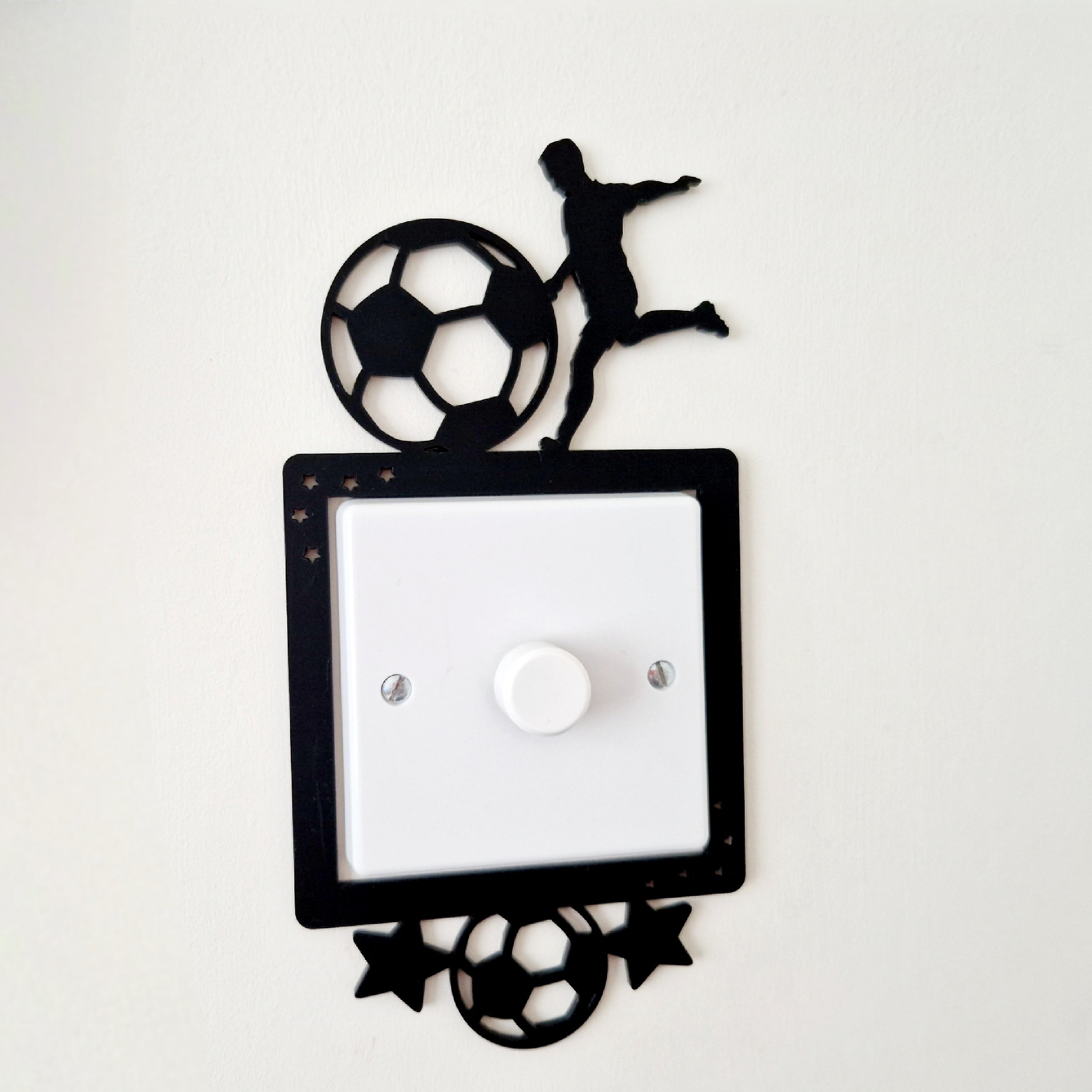Decorative light switch cover with soccer ball and player design