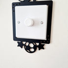 Decorative black light switch cover with football design