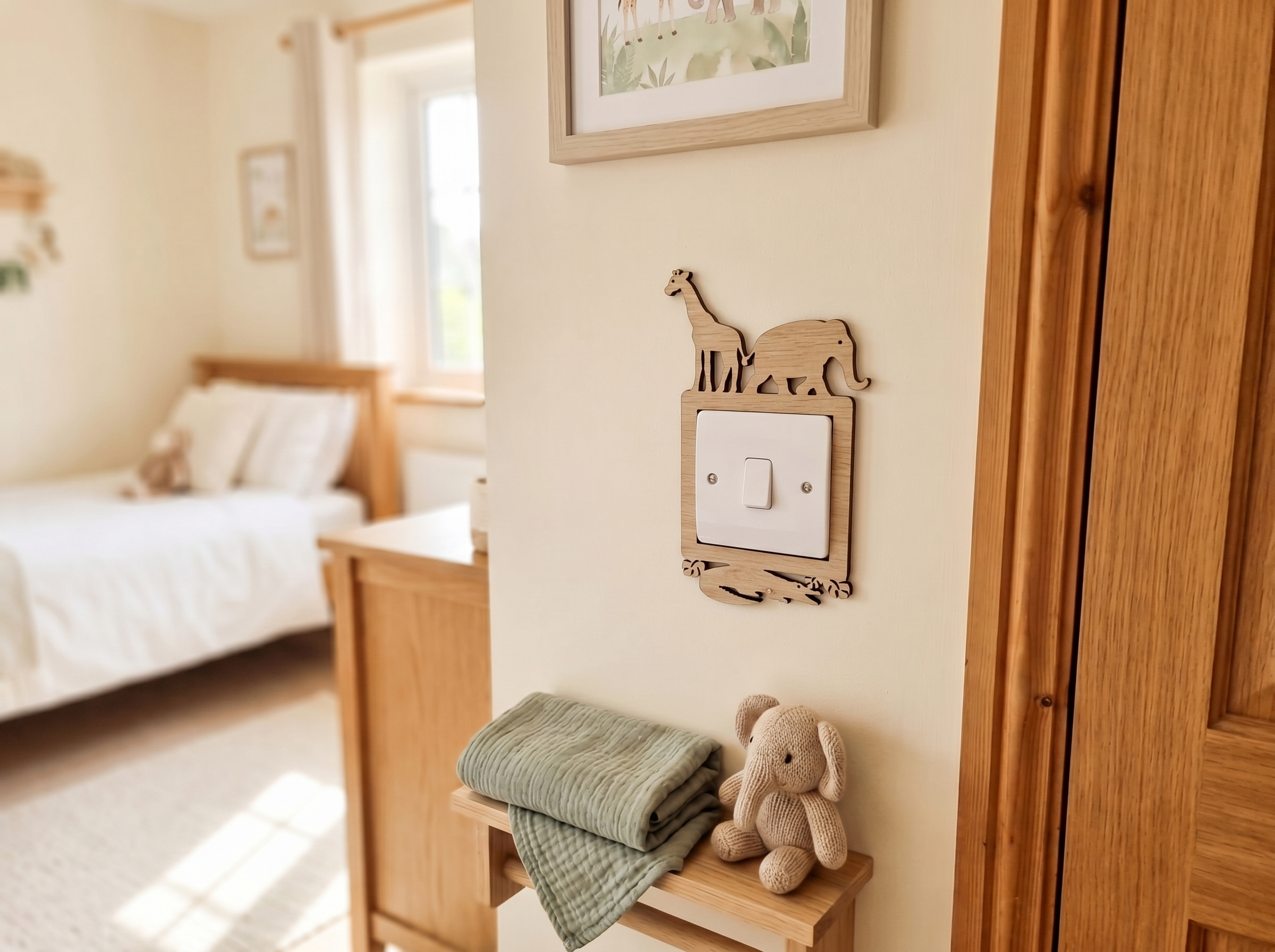 A safari themed children's room with wooden light switch surround featuring safari animal shapes.