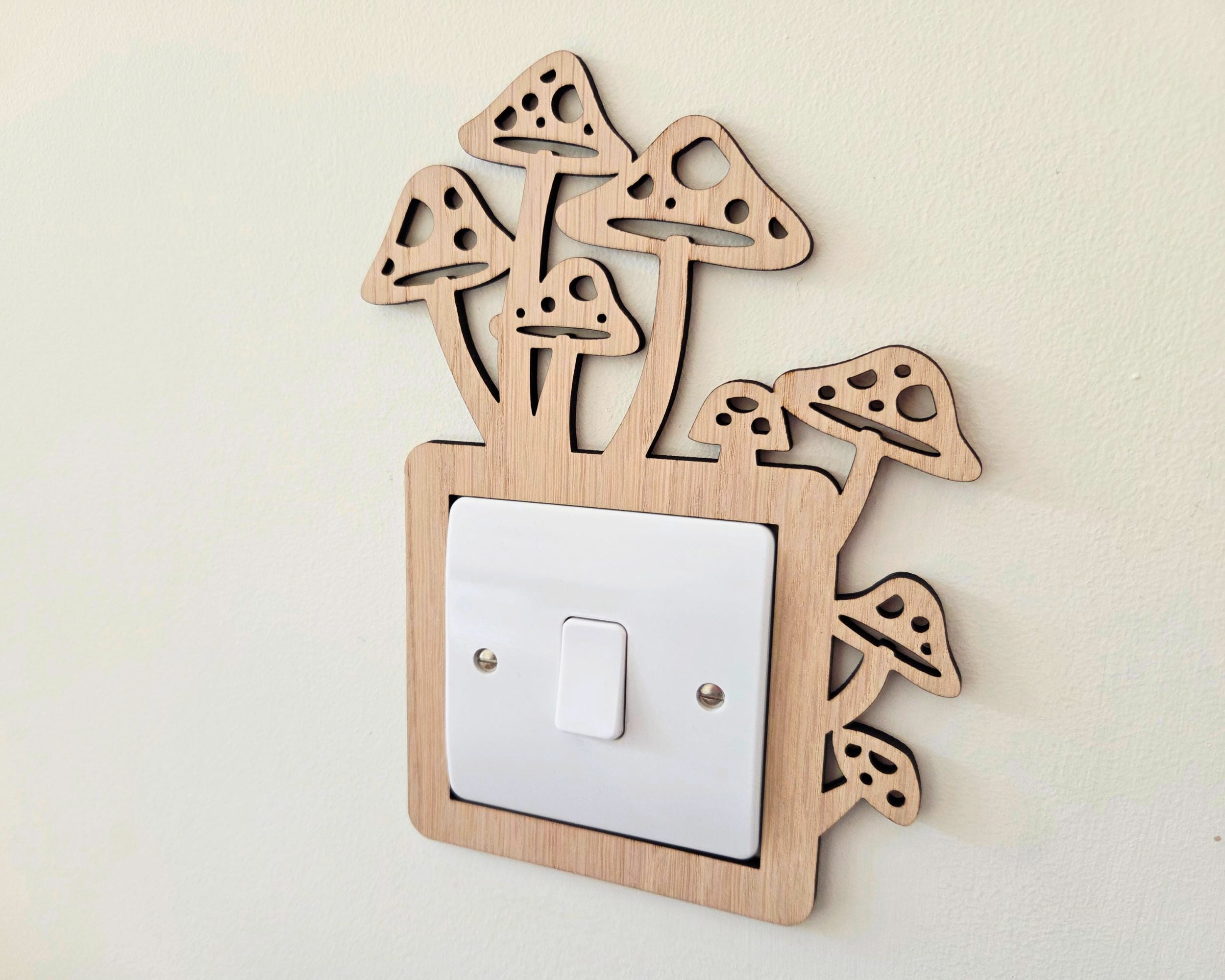 A wooden mushroom-shaped light switch on a wall.